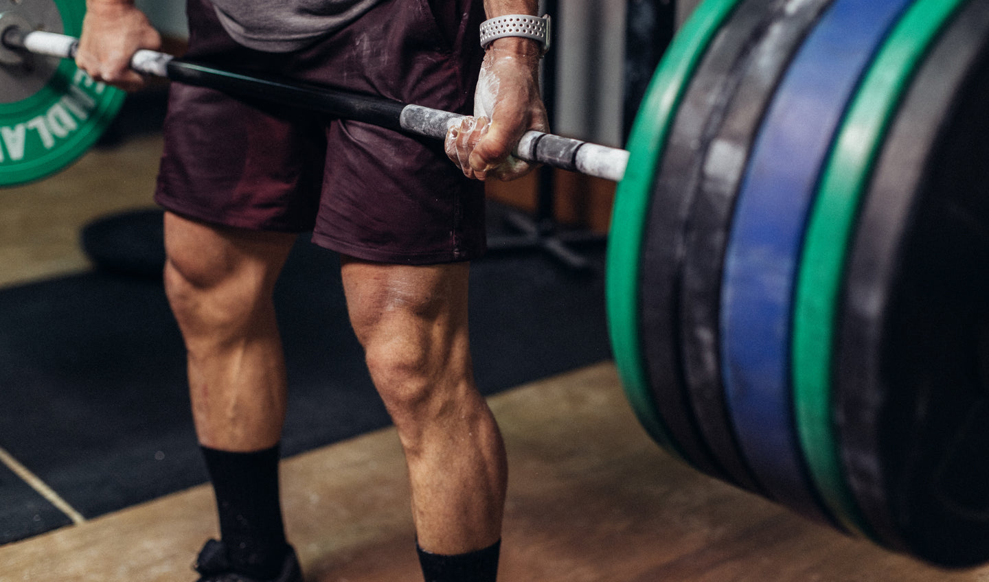 Holding a barbell in the Foundation Short